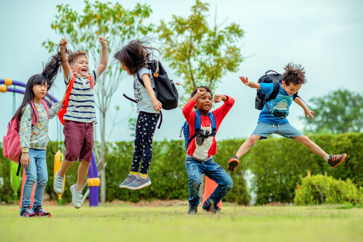 elementary school students outside at recess